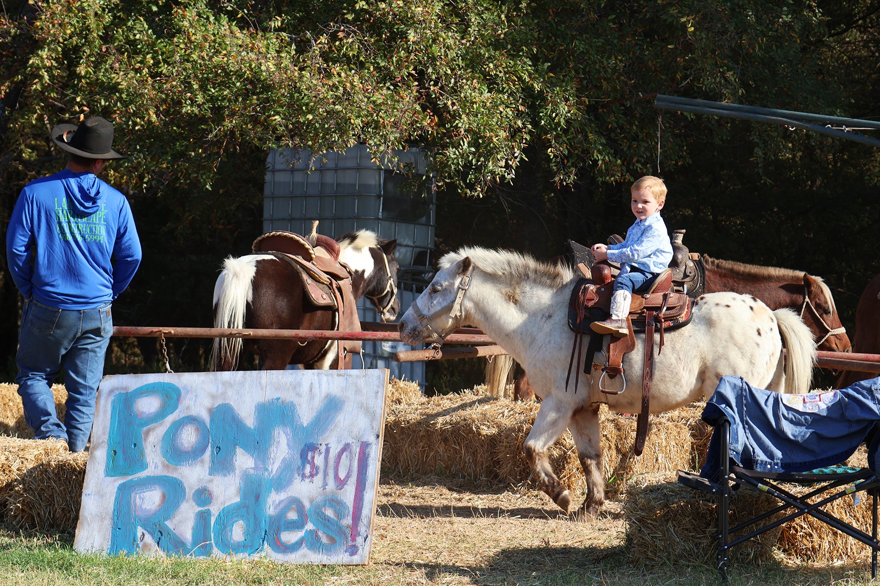 Kid enjoying pony rides