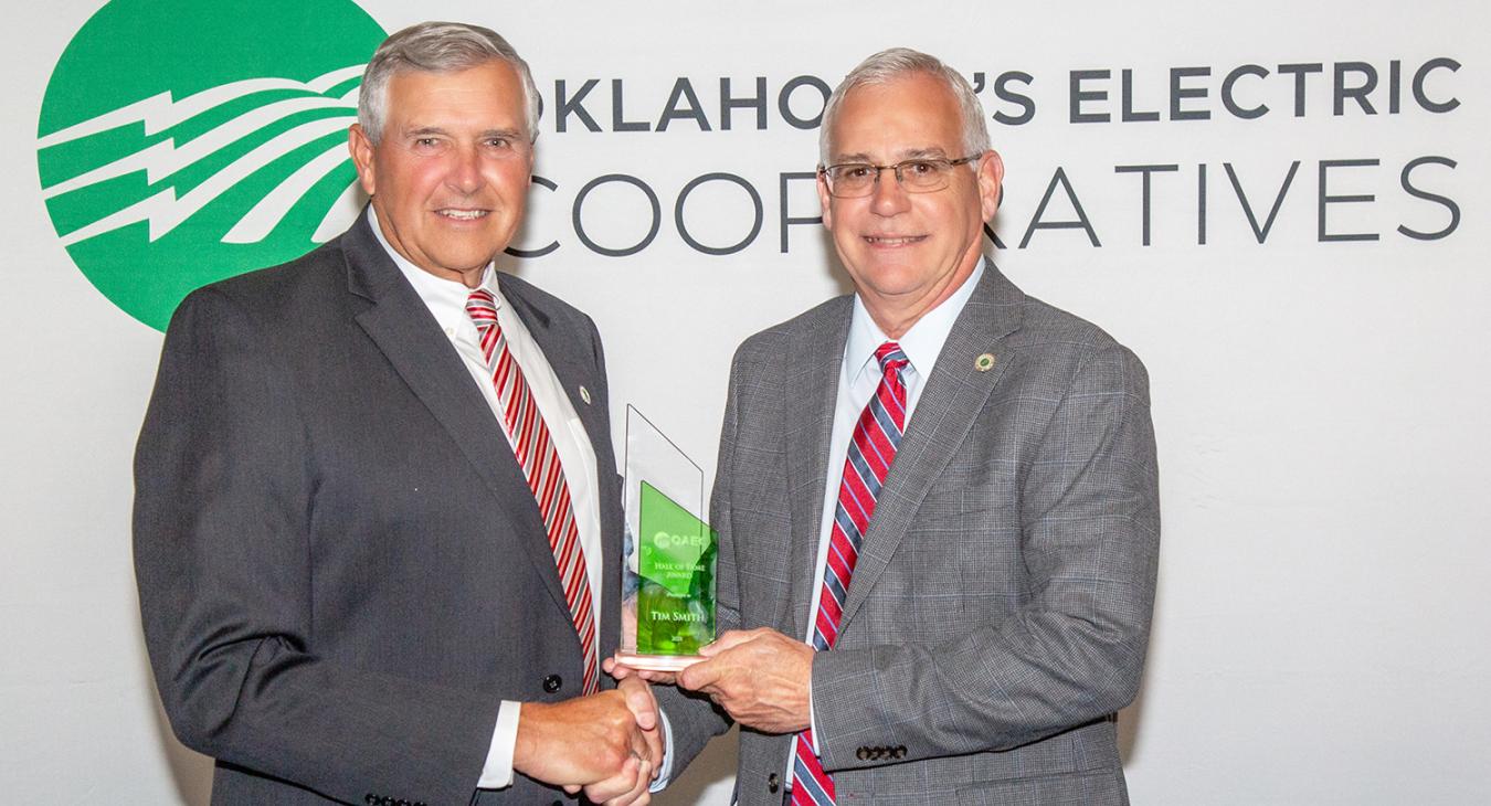 OAEC General Manager Chris Meyers (right) presents the Hall of Fame Award to Tim Smith (left), GM of East Central Electric Cooperative based in Okmulgee, Oklahoma. 