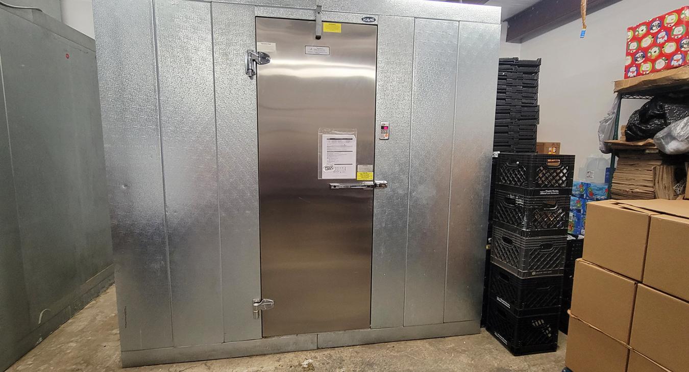 A large walk-in refrigerator at Bristow Social Services provided by Operation Roundup.